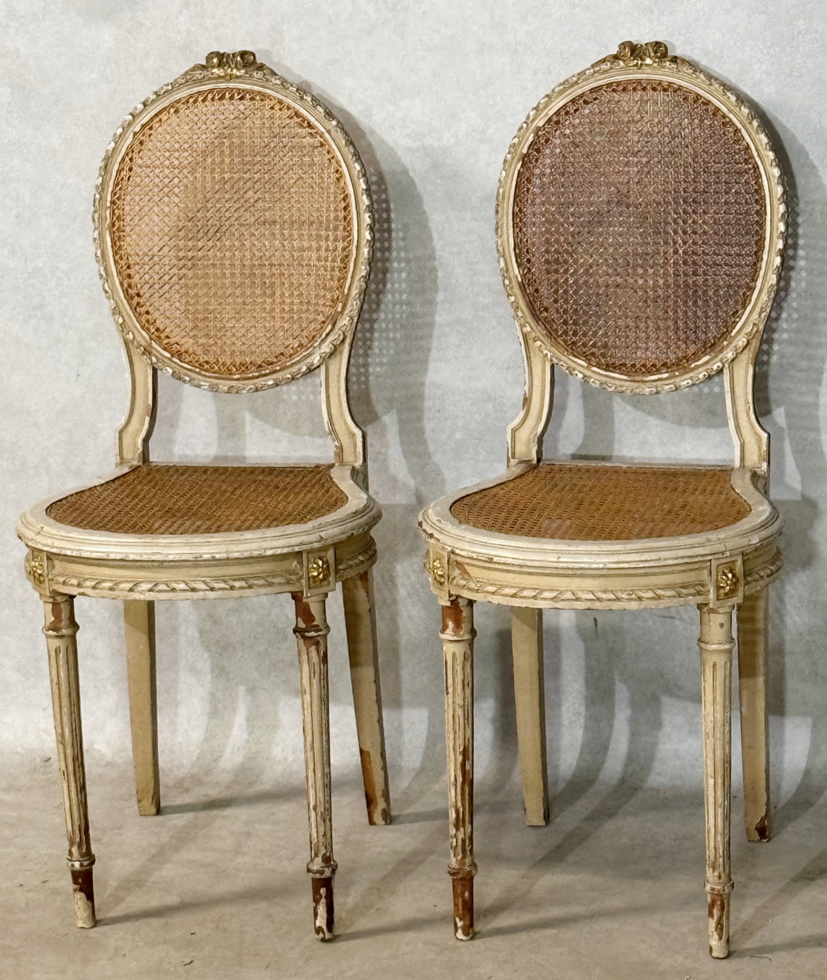 A pair of Parisian Hall Chairs 